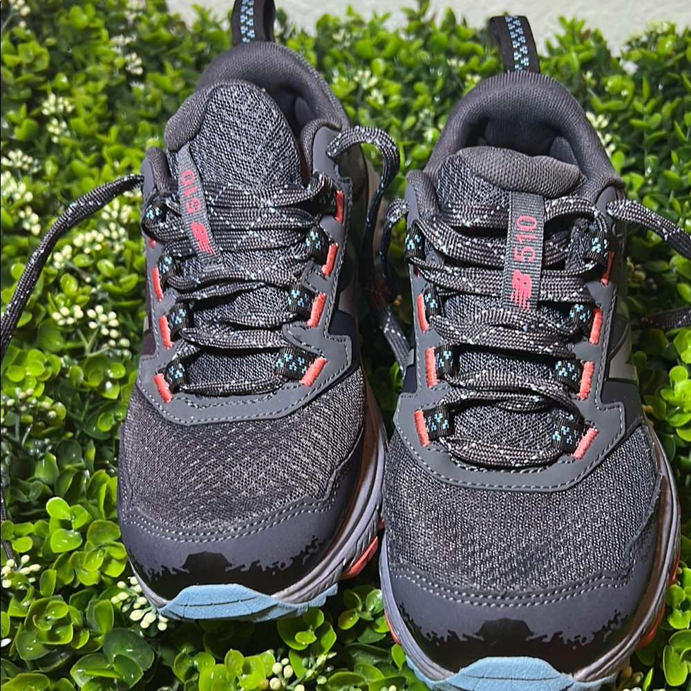 Black and Blue Athletic Shoes with Breathable Mesh and Traction Outsole